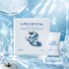 Bykare Lipo Crystal skin brightening supplement packaging box and a 3g single sachet displayed on premium ice-like crystal blocks with water bubbles. Packaging text reads: "Herbosomal White Tomato C Pine, Campuran Minuman Botani Nanas dengan Ekstrak Tomato Putih dan Vitamin C" for advanced antioxidant and skin whitening.