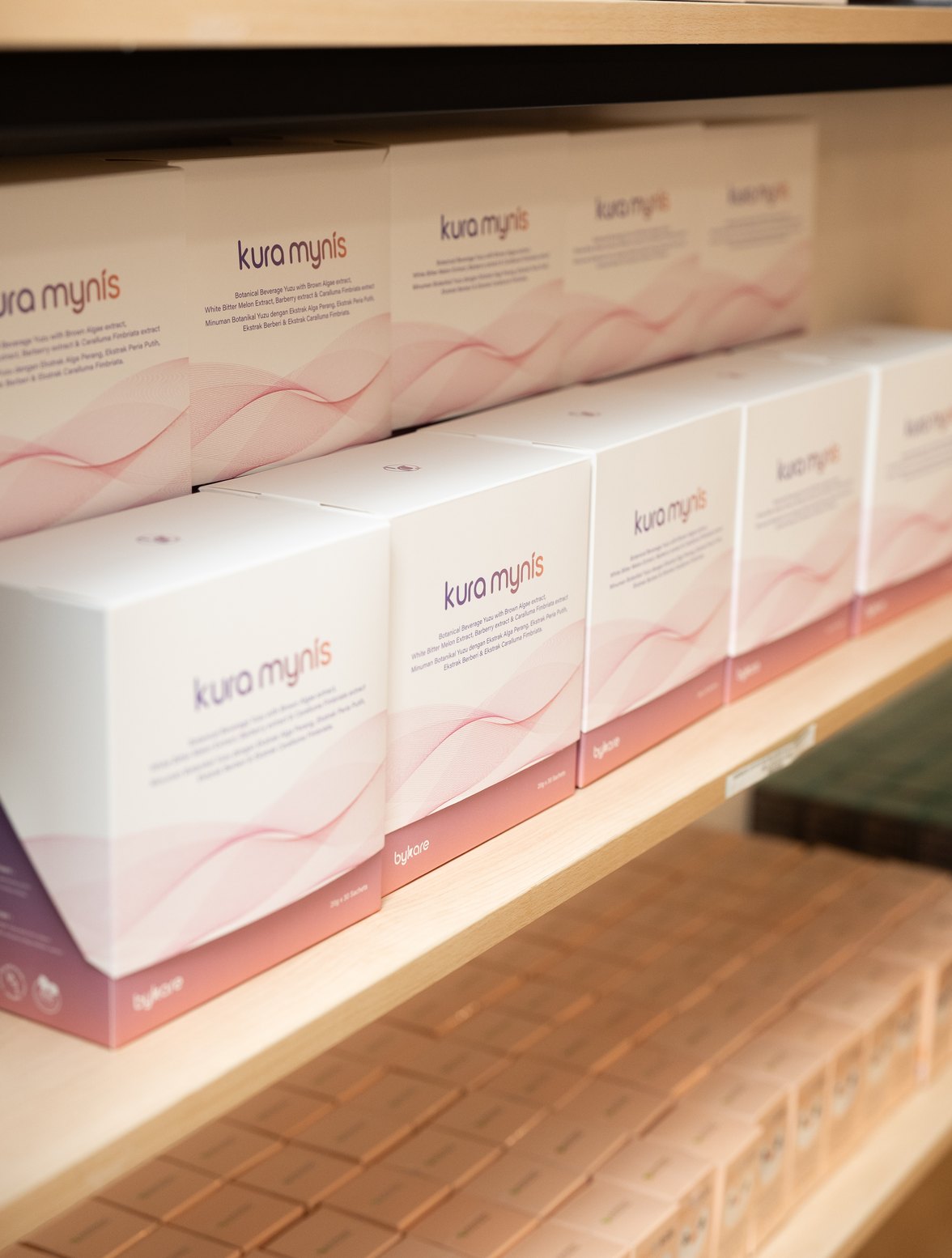 Kura Mynis boxes on a pharmacy shelf in Malaysia