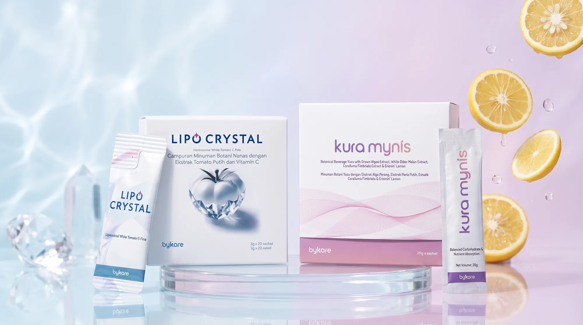 Lipo Crystal and Kura Mynis boxes on a glass podium