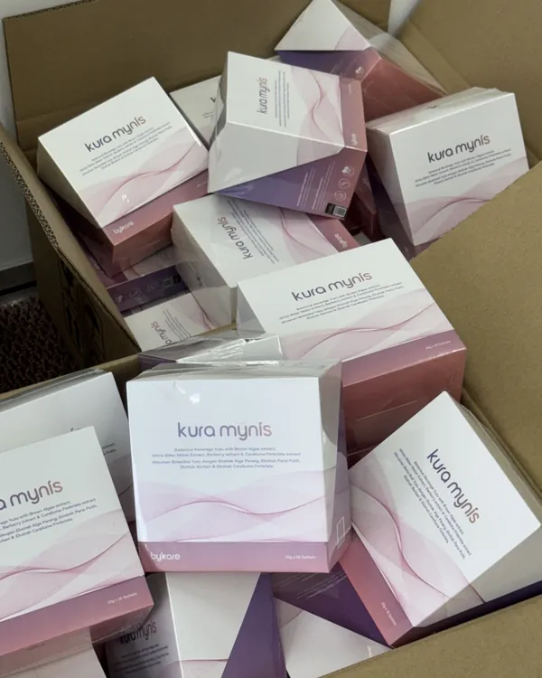 An open carton full of sealed Kura Mynis boxes