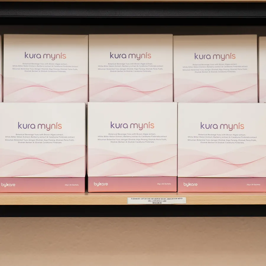 Kura Mynis boxes on a pharmacy shelf
